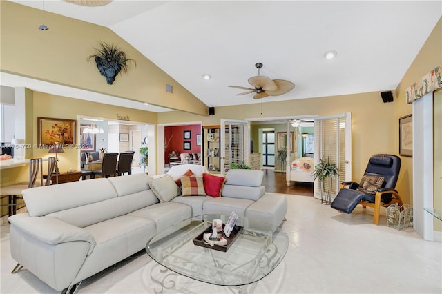 living area with high vaulted ceiling, visible vents, and recessed lighting