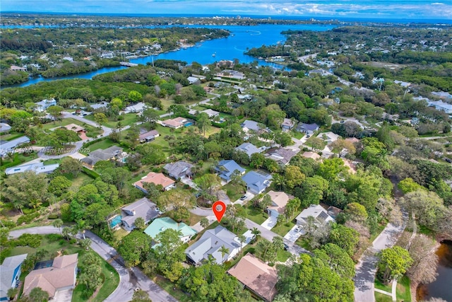 aerial view featuring a water view and a residential view