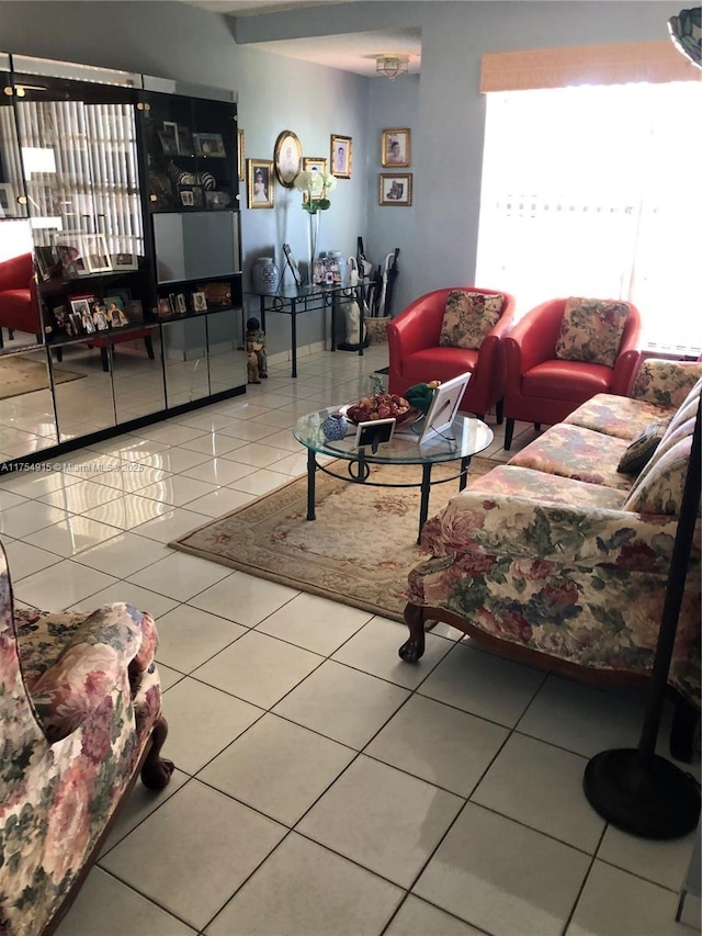 living room with tile patterned flooring