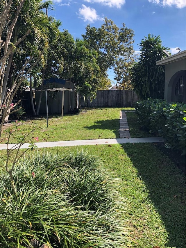 view of yard with fence