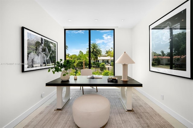 4425 Adams Ave, Miami Beach, FL 33140 - office area featuring baseboards and floor to ceiling windows