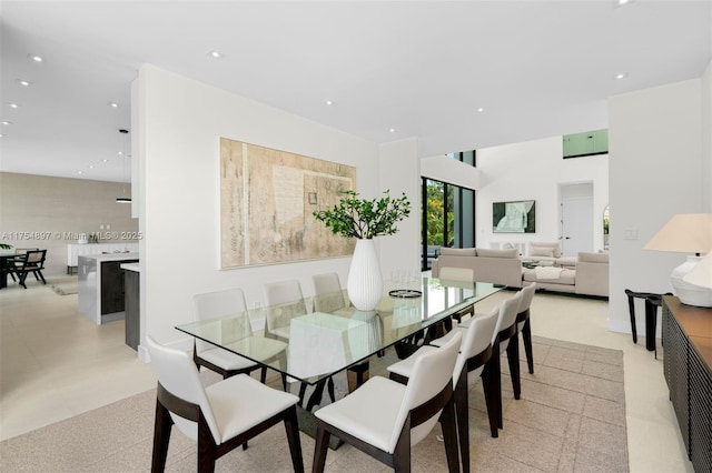 dining space featuring recessed lighting