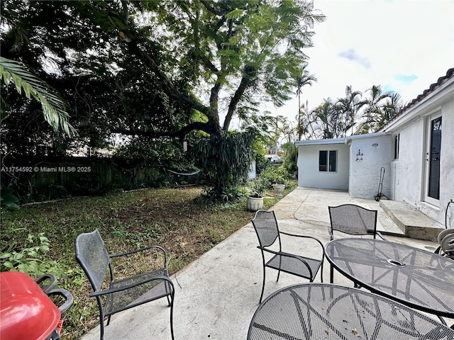 view of patio featuring outdoor dining space