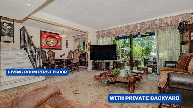 430 Poinciana Dr Unit 1710, Sunny Isles Beach, FL 33160 - living room featuring ornamental molding, stairway, and a textured ceiling