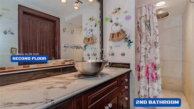 430 Poinciana Dr Unit 1710, Sunny Isles Beach, FL 33160 - bathroom featuring vanity and a shower with shower curtain