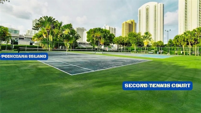 430 Poinciana Dr Unit 1710, Sunny Isles Beach, FL 33160 - view of tennis court featuring a view of city and fence