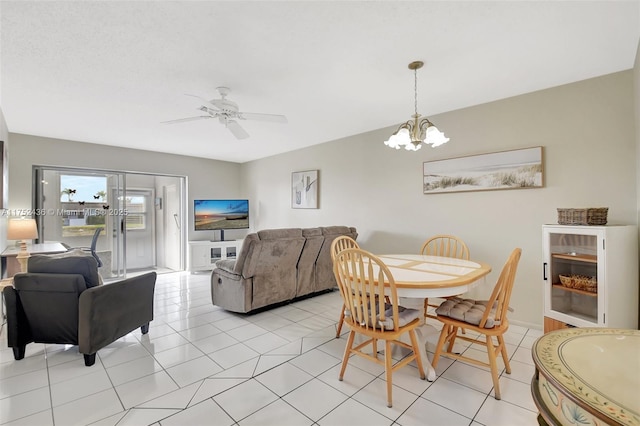2775 W Dudley Dr W Unit E, West Palm Beach, FL 33415 - dining area featuring a chandelier, light tile patterned floors, and ceiling fan