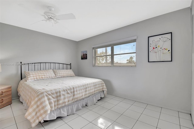 bedroom featuring light tile patterned flooring and ceiling fan