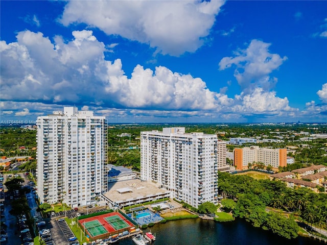 aerial view with a city view and a water view