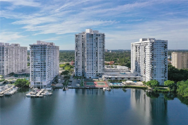 aerial view featuring a water view and a view of city