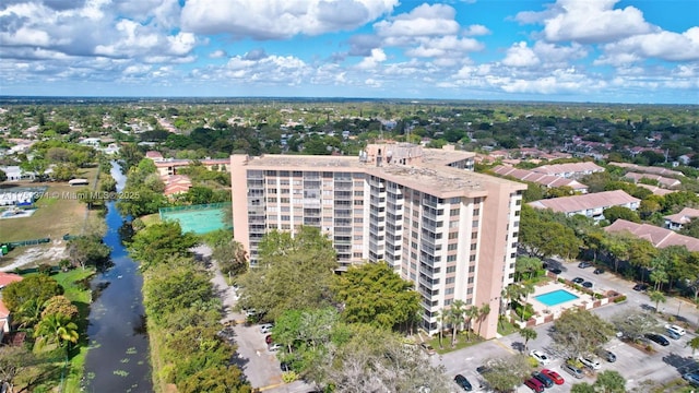 10777 W Sample Rd Unit 912, Coral Springs, FL 33065 - drone / aerial view of a pool area and apartment complex