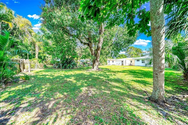 view of yard featuring fence