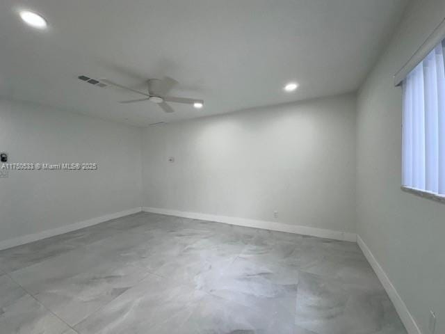 unfurnished room featuring ceiling fan, recessed lighting, visible vents, and baseboards