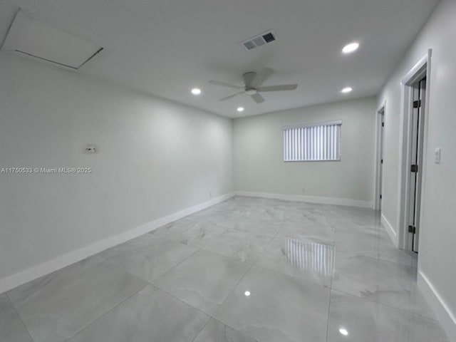 spare room with baseboards, visible vents, a ceiling fan, and recessed lighting