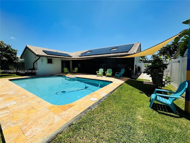 view of pool with a fenced in pool, a patio area, a fenced backyard, and a lawn