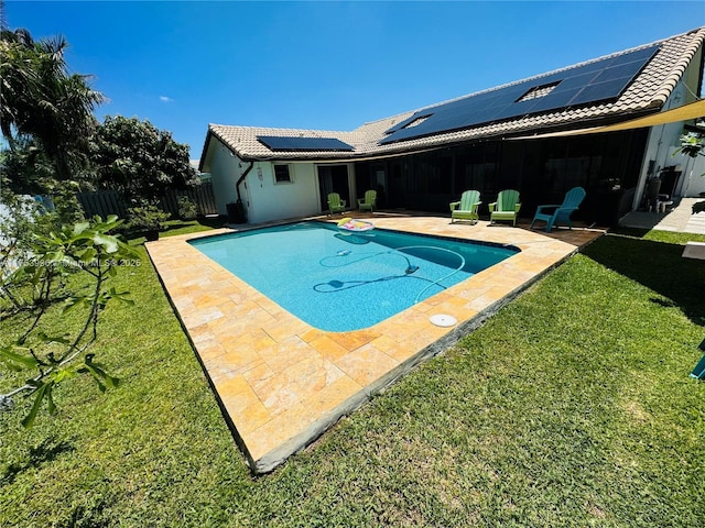 view of swimming pool featuring a fenced backyard, a fenced in pool, a patio, and a lawn