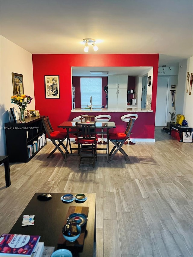 dining room featuring wood finished floors