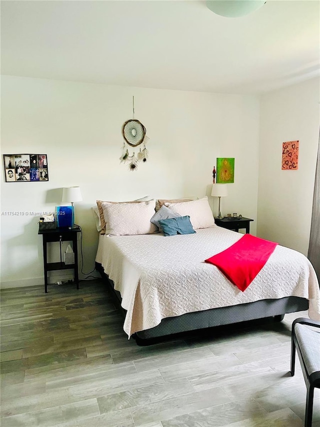 415 SE 11th Ter Unit 205, Dania Beach, FL 33004 - bedroom featuring wood finished floors