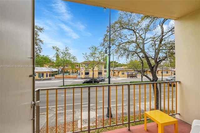 balcony featuring a residential view