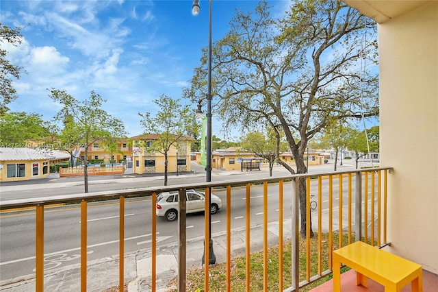 balcony featuring a residential view