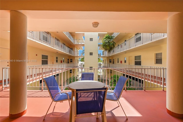 view of patio with a balcony