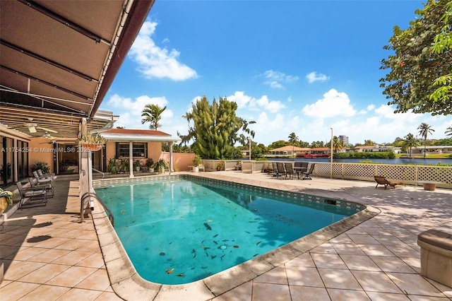 view of pool featuring a fenced in pool and a patio area