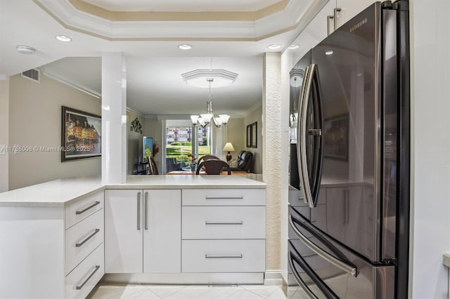 kitchen with visible vents, refrigerator with ice dispenser, light countertops, and crown molding