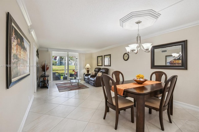 dining room featuring baseboards, light tile patterned flooring, and crown molding