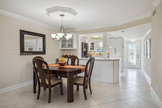 dining area featuring ornamental molding, visible vents, baseboards, and light tile patterned floors