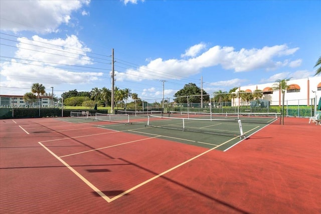 view of sport court with fence