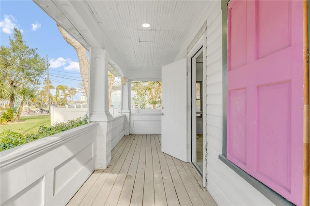 wooden deck featuring a porch