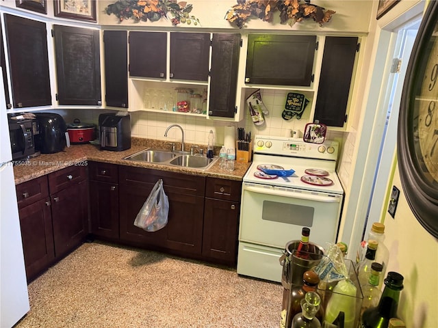 5901 Garfield St, Hollywood, FL 33021 - kitchen with dark brown cabinets, a sink, white electric range oven, and decorative backsplash