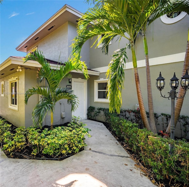 exterior space with stucco siding