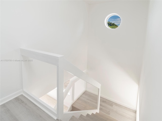 1323 NE 5th Ave, Fort Lauderdale, FL 33304 - stairway featuring wood finished floors and baseboards