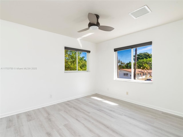 1323 NE 5th Ave, Fort Lauderdale, FL 33304 - empty room featuring light wood-style floors, ceiling fan, and baseboards