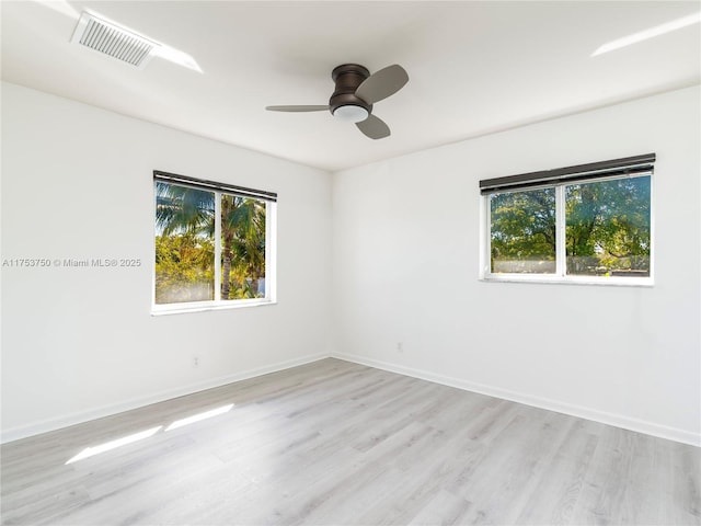 1323 NE 5th Ave, Fort Lauderdale, FL 33304 - unfurnished room featuring light wood-style floors, ceiling fan, and baseboards