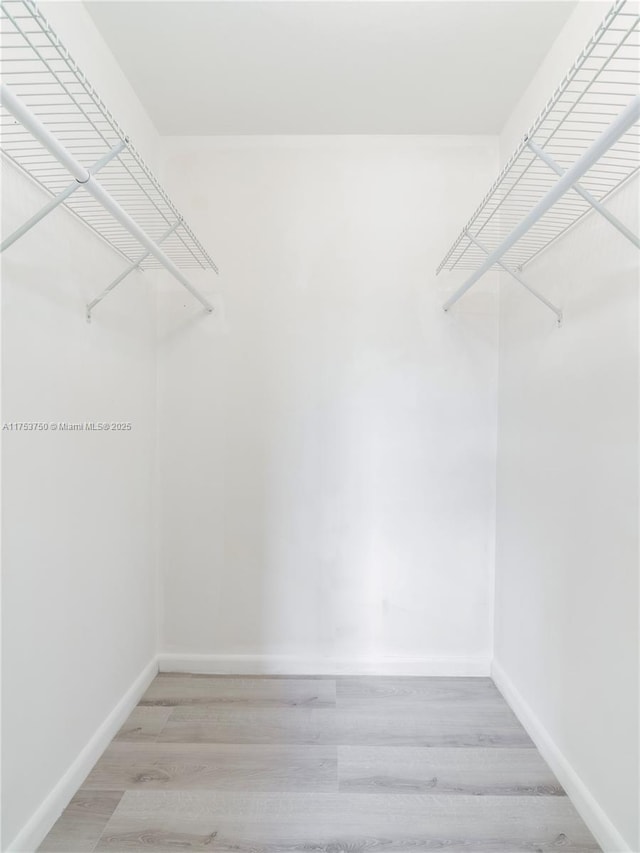 1323 NE 5th Ave, Fort Lauderdale, FL 33304 - spacious closet featuring wood finished floors