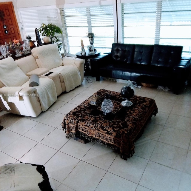 living room with tile patterned flooring