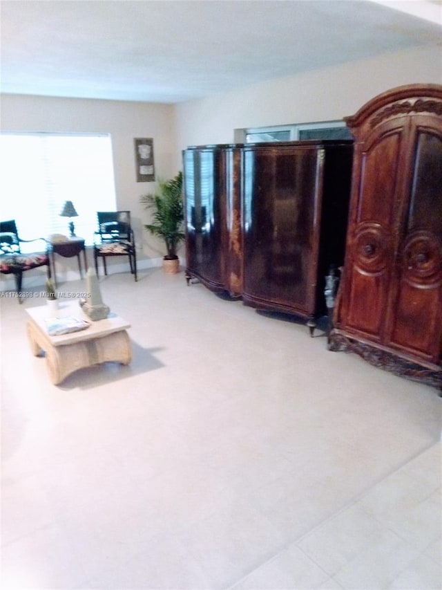 living area featuring light floors