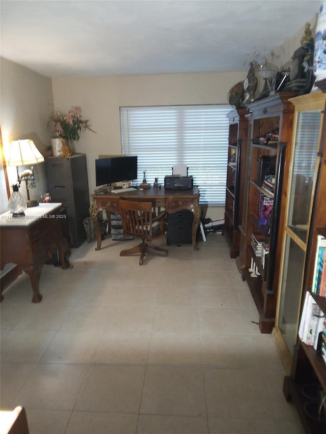 home office with light tile patterned floors