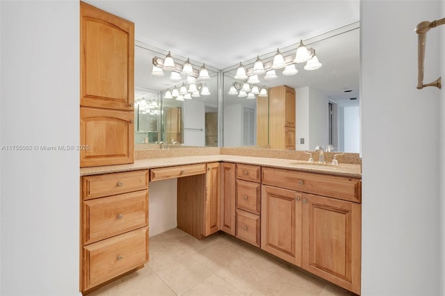 bathroom featuring tile patterned floors, a sink, and double vanity