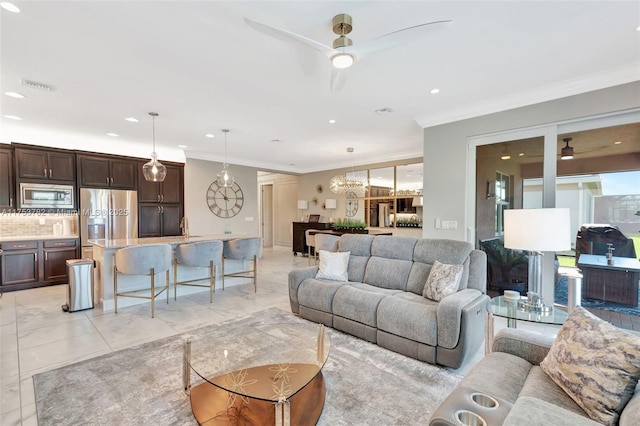 living room with ceiling fan, recessed lighting, visible vents, marble finish floor, and ornamental molding
