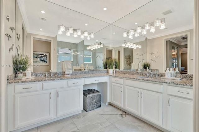 full bath with visible vents, ornamental molding, marble finish floor, walk in shower, and vanity