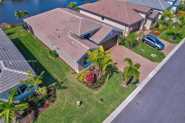 bird's eye view with a water view