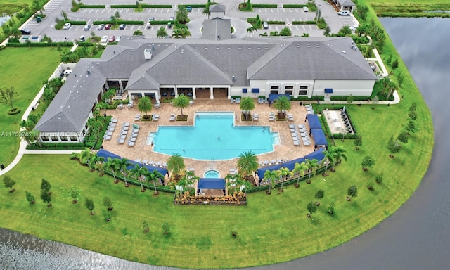 birds eye view of property featuring a water view