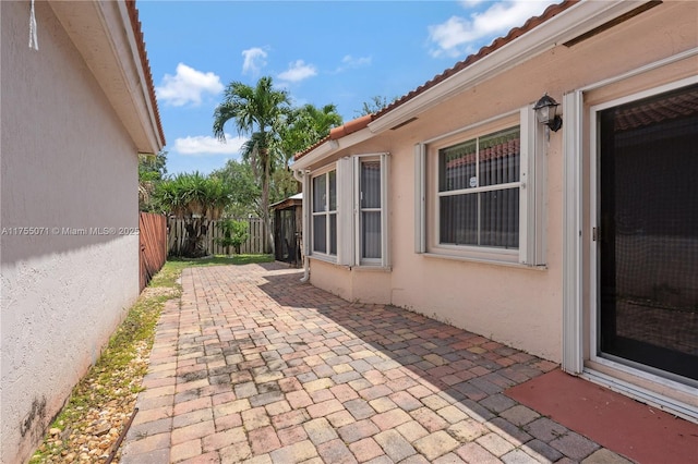 view of patio featuring fence