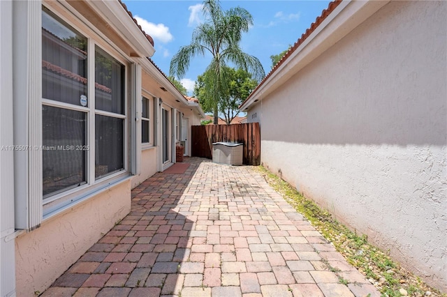 view of patio featuring fence