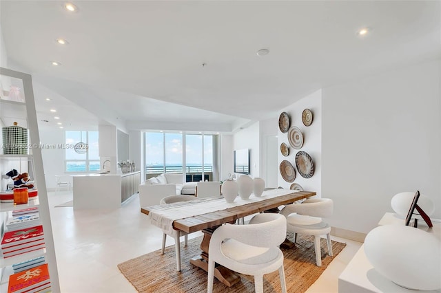 dining room with recessed lighting