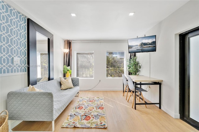 living room with wood finished floors and baseboards