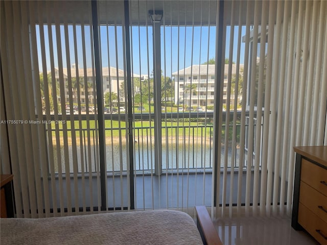 view of gate with a water view